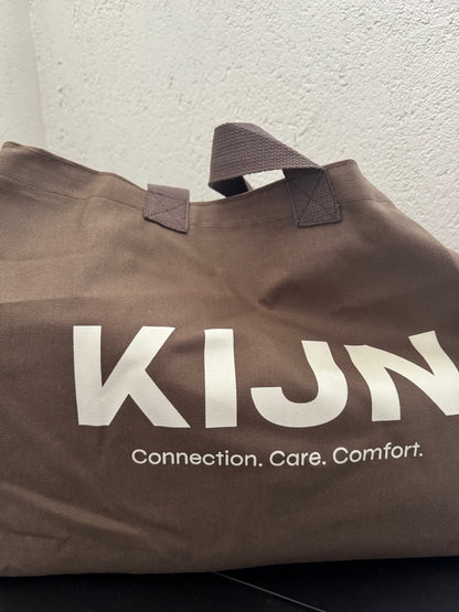 Minimalist chocolate tote bag paired with second skin leggings, KIJN