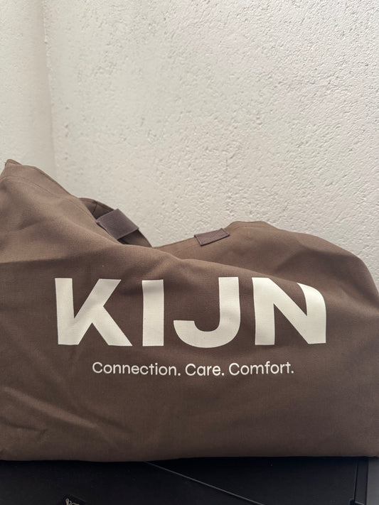 Deep chocolate brown tote with oversized sweaters for leggings