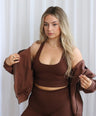 Layered look with Oversized Zip Hoodie in Hot Chocolate over activewear