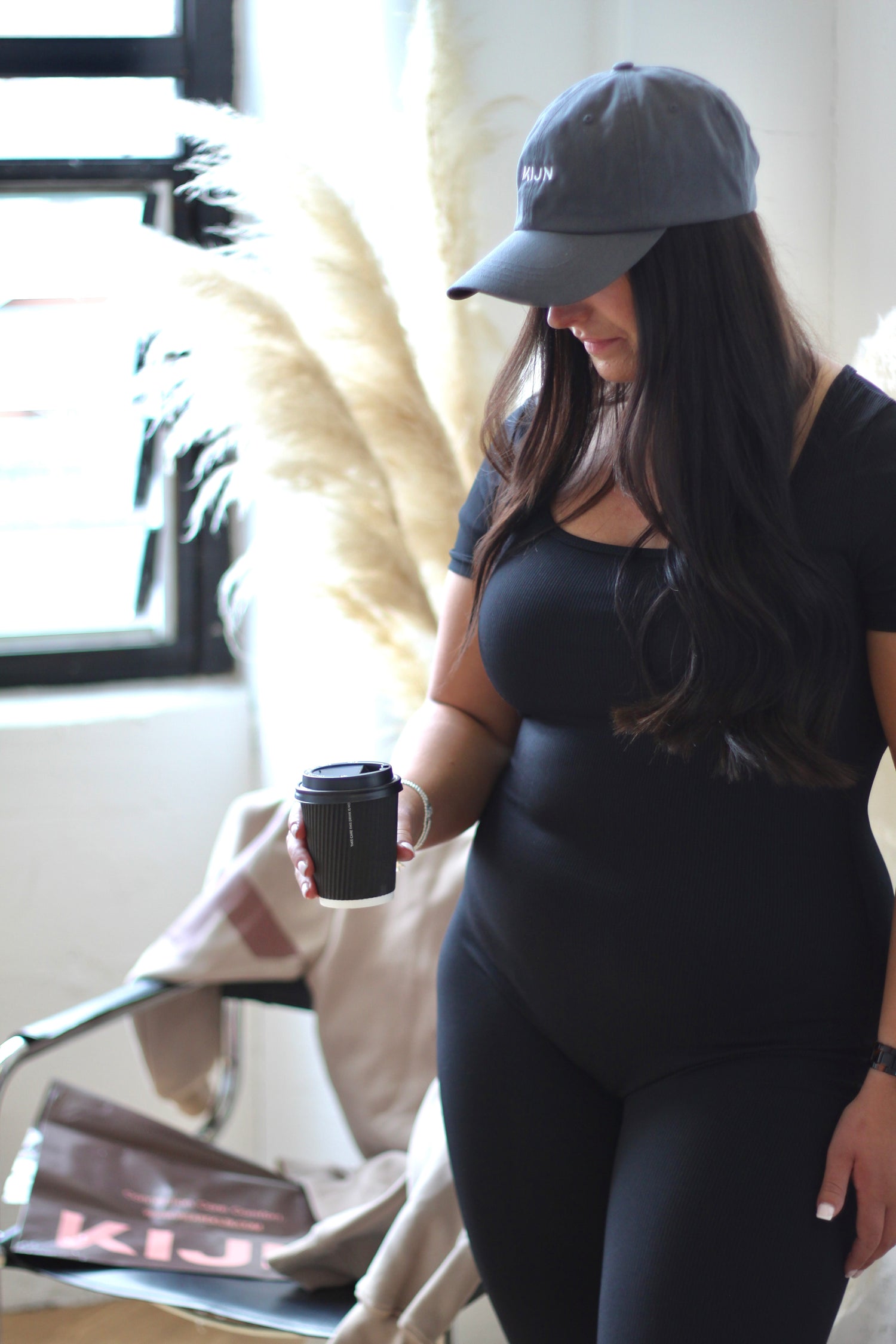 Ribbed unitard in black, perfect for yoga and Pilates