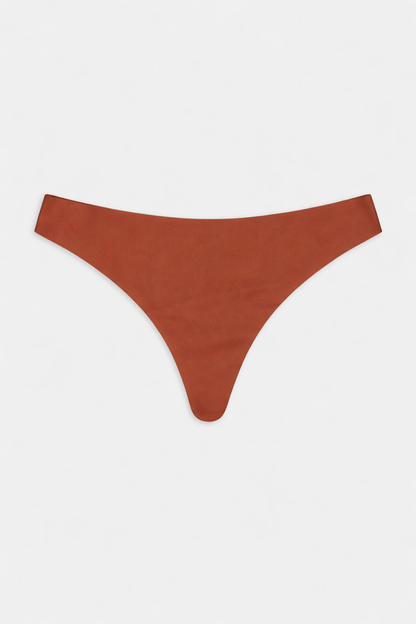SKIJN™ SEAMLESS THONG | CLAY